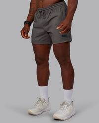 Man wearing Daily 5" Short - Dark Storm | Model:Sam | Size:L