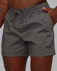 Man wearing Daily 5" Short - Dark Storm | Model:Sam | Size:L