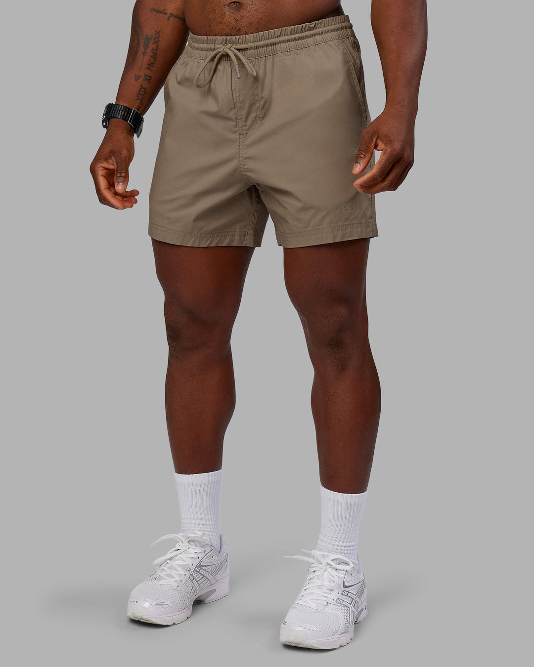 Man wearing Daily 5" Short - Greige | Model:Sam | Size:L