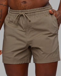 Man wearing Daily 5" Short - Greige | Model:Sam | Size:L