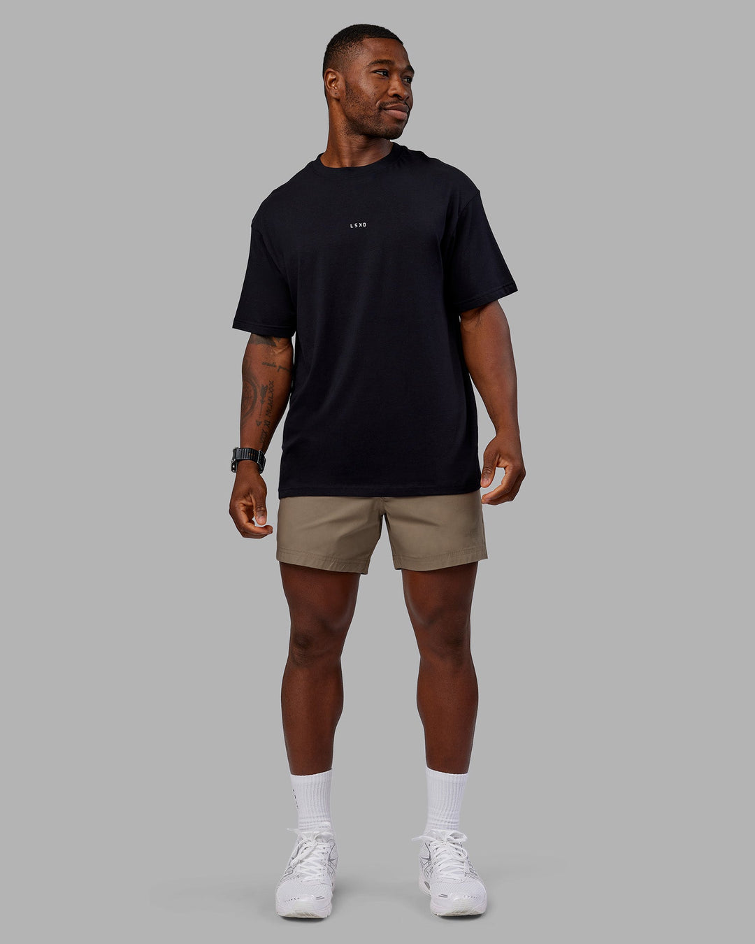 Man wearing Daily 5" Short - Greige | Model:Sam | Size:L
