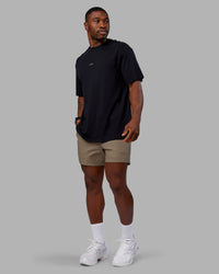 Man wearing Daily 5" Short - Greige | Model:Sam | Size:L
