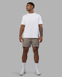 Man wearing Daily Pigment 5" Short - Pigment Slate | Model:Xav | Size:L