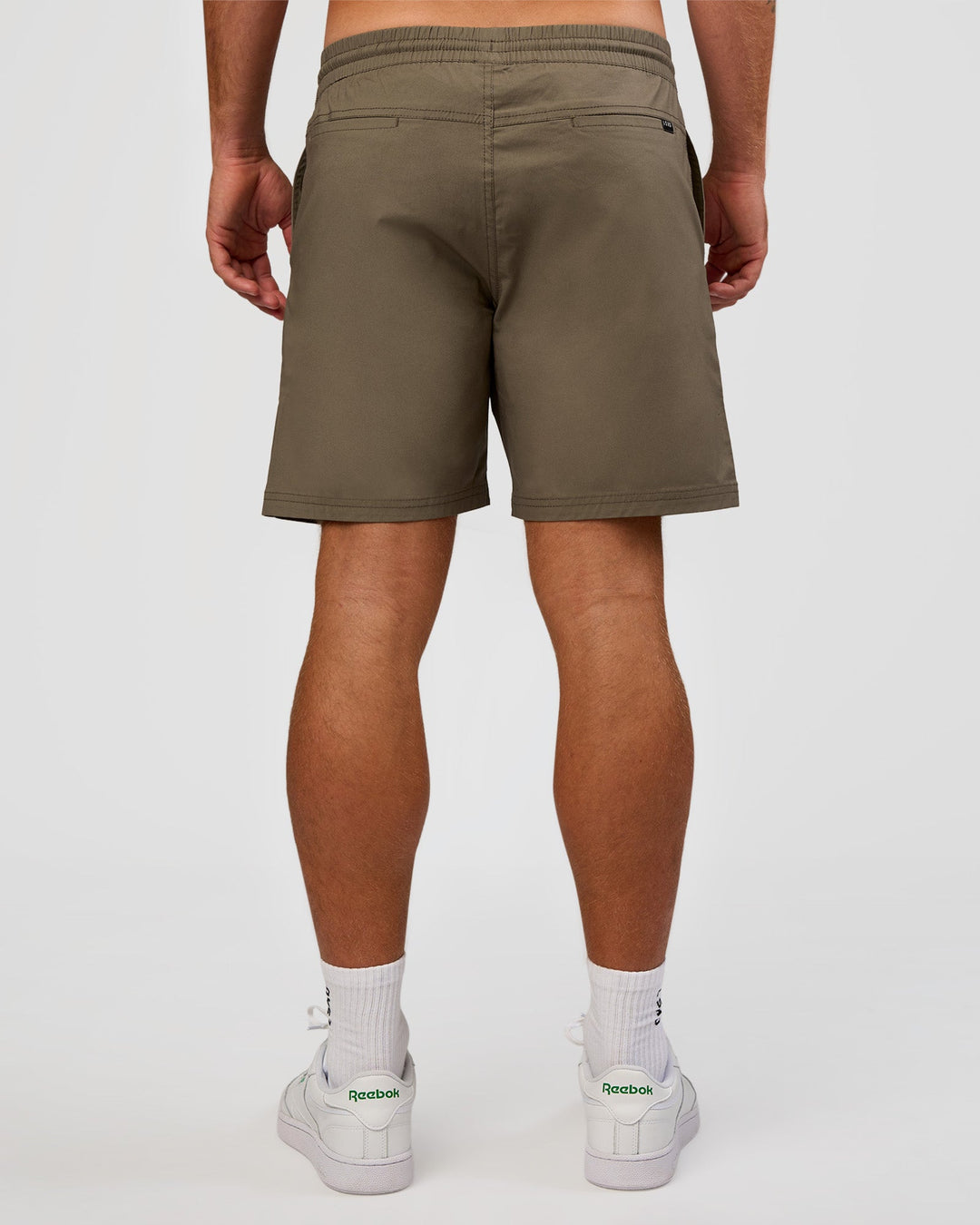 Man wearing Daily 7" Short - Walnut Grey | Model:Marcus | Size:L