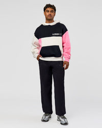 Man wearing Deconstructed Fleece Hoodie - Caviar-Candy Pink-Grey Marl | Model:Xav | Size:L