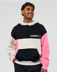 Man wearing Deconstructed Fleece Hoodie - Caviar-Candy Pink-Grey Marl | Model:Xav | Size:L