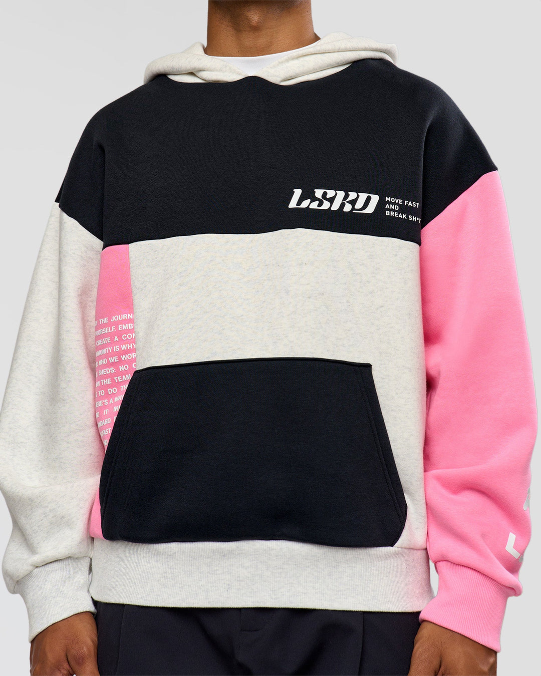 Man wearing Deconstructed Fleece Hoodie - Caviar-Candy Pink-Grey Marl | Model:Xav | Size:L