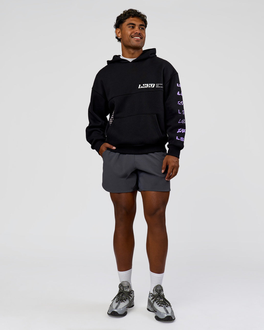 Man wearing Deconstructed Fleece Hoodie - Caviar-Marshmallow-Pale Lilac | Model:Xav | Size:L