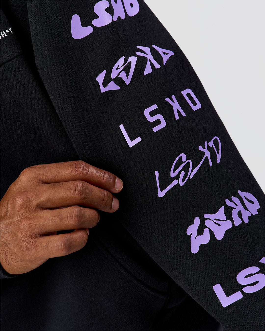 Man wearing Deconstructed Fleece Hoodie - Caviar-Marshmallow-Pale Lilac | Model:Xav | Size:L