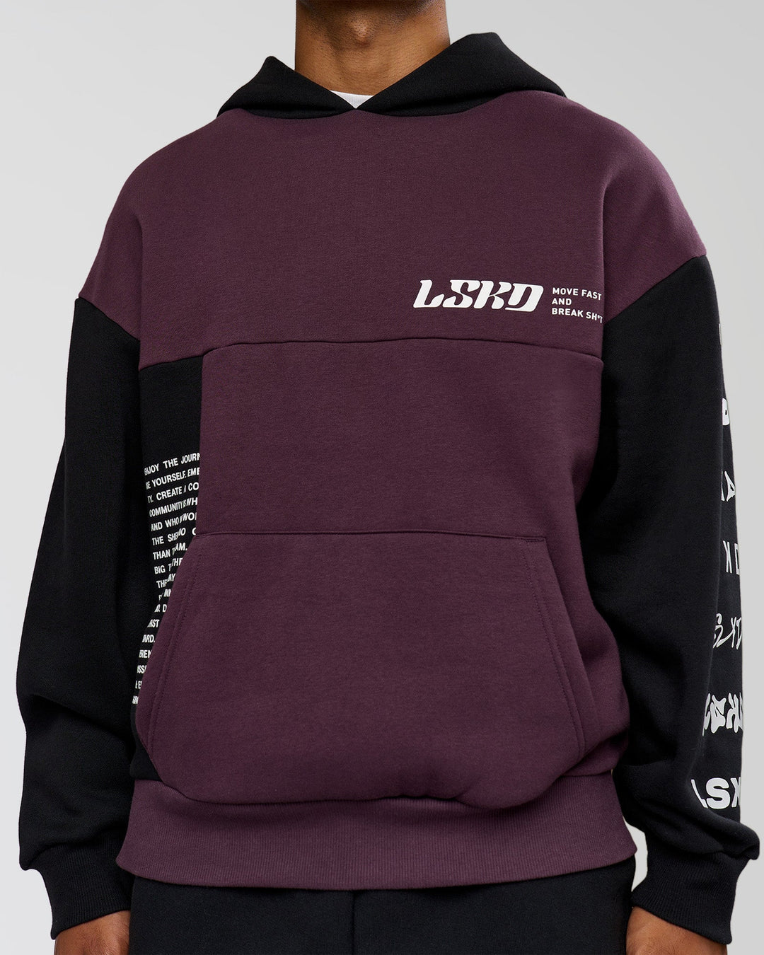 Man wearing Deconstructed Fleece Hoodie - Caviar-Midnight Plum | Model:Xav | Size:L