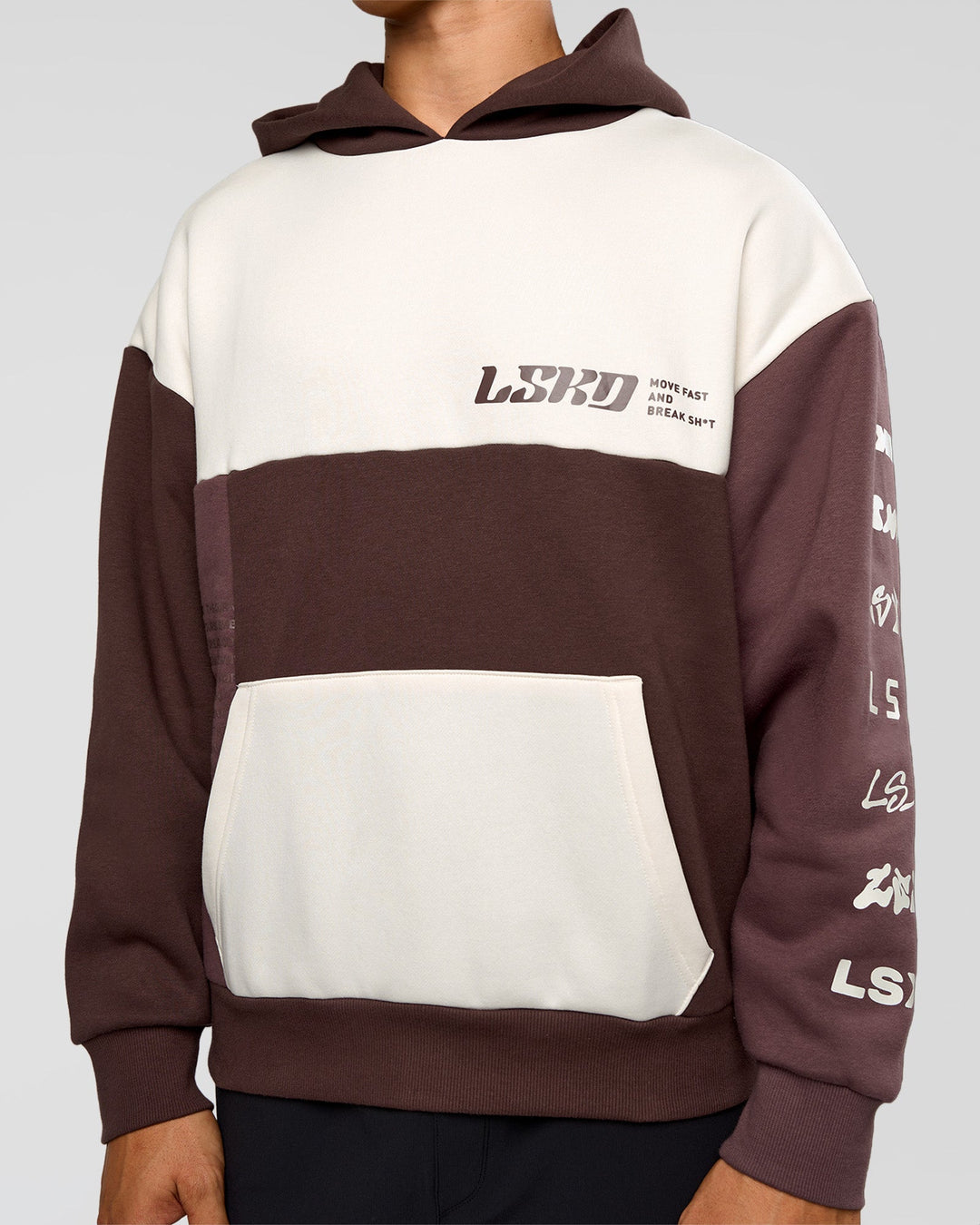 Man wearing Deconstructed Fleece Hoodie - Off White-Cocoa Powder-Choc | Model:Jackson | Size:L