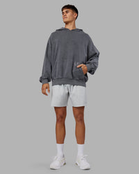 Man wearing ETJ Values Washed Unisex Oversize Hoodie - Dark Storm-Light Bubblegum | Model:Jackson | Size:L