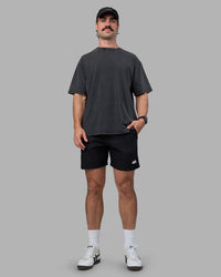 Man wearing Easy FLXCotton Tee Oversize - Black Washed | Model:Adam | Size:L | Thumbnail Index: 8