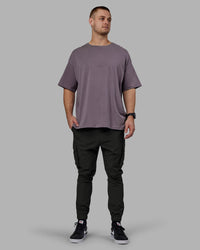 Man wearing Energy Stretch Performance Cargo Joggers - Pirate Black