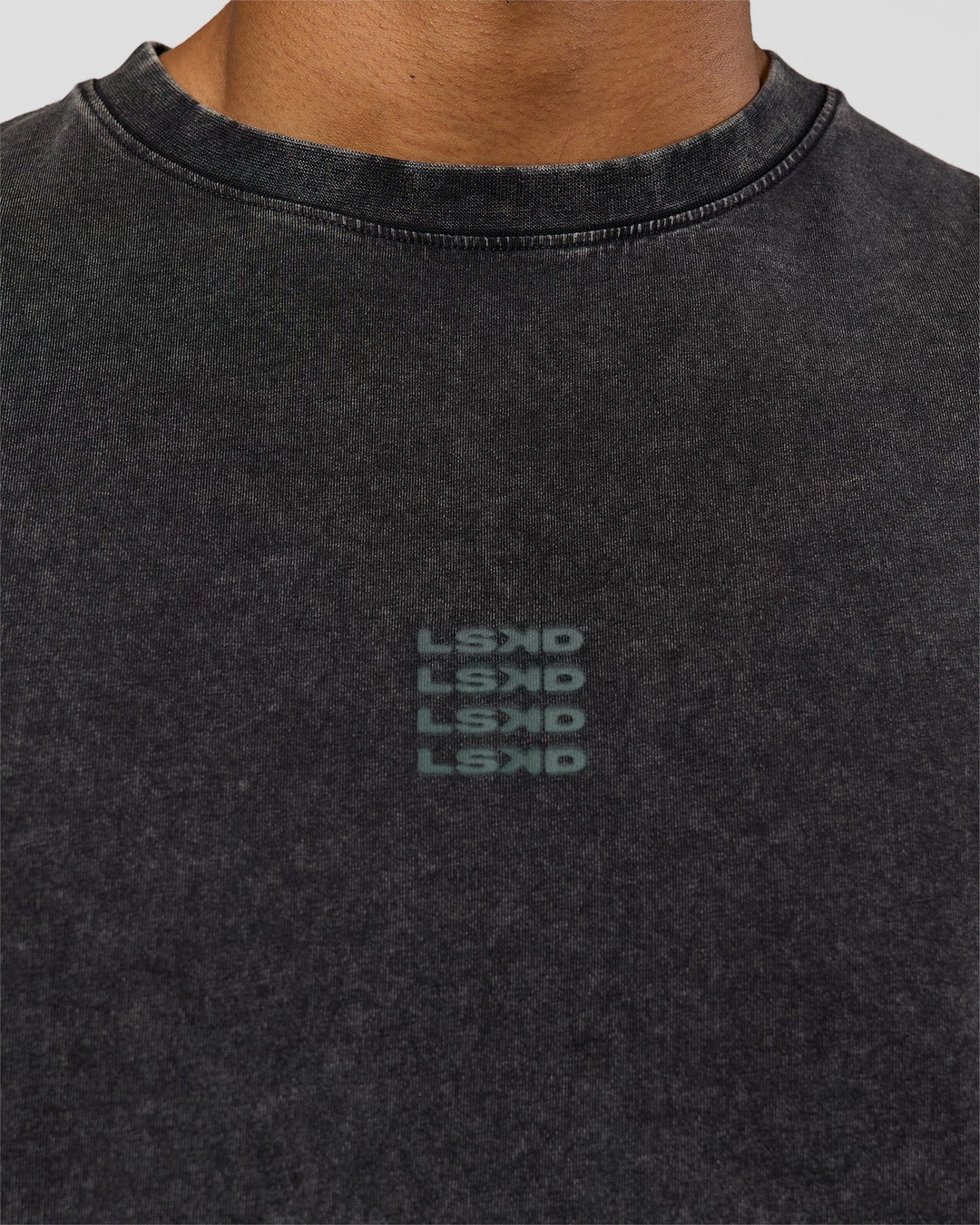 Man wearing Everyday Elevation FLXCotton Oversized Tee - Black Washed-Carbon Green | Model:Xav | Size:L