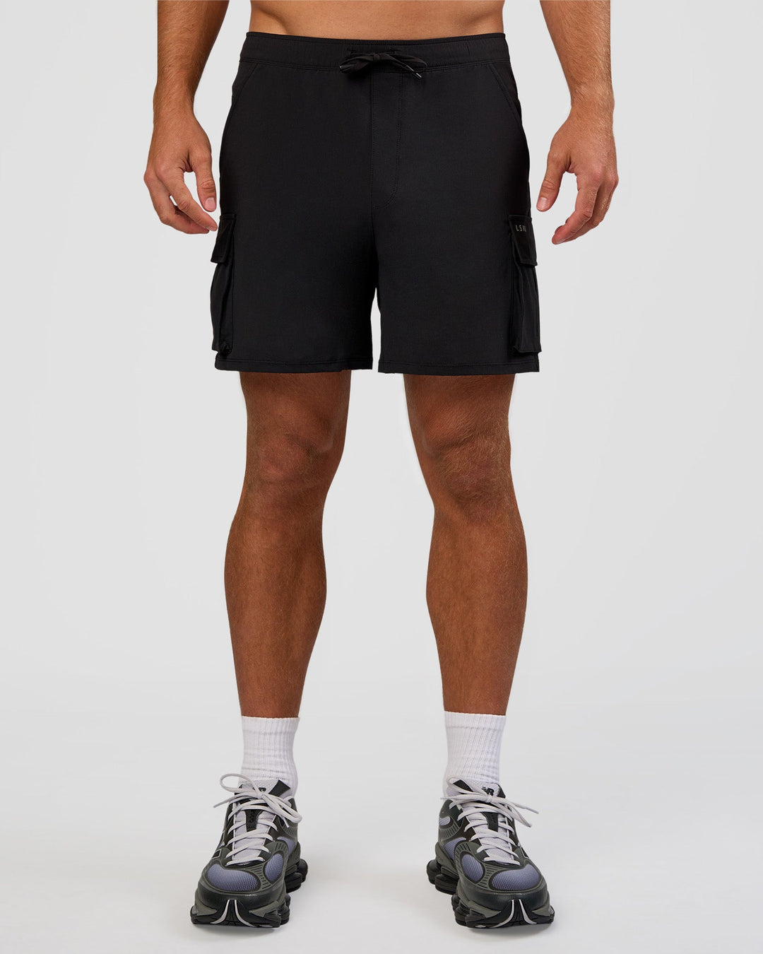 Man wearing Functional Cargo 6" Short - Black | Model:Marcus | Size:L