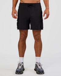 Man wearing Functional Cargo 6" Short - Black | Model:Marcus | Size:L