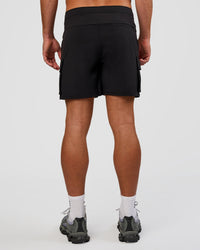 Man wearing Functional Cargo 6" Short - Black | Model:Marcus | Size:L