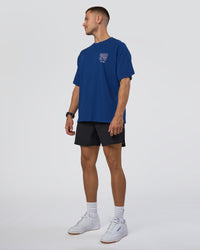 Man wearing GTC Heavyweight Oversized Tee - Washed Midnight Blue-Marsh | Model:Nikola | Size:L