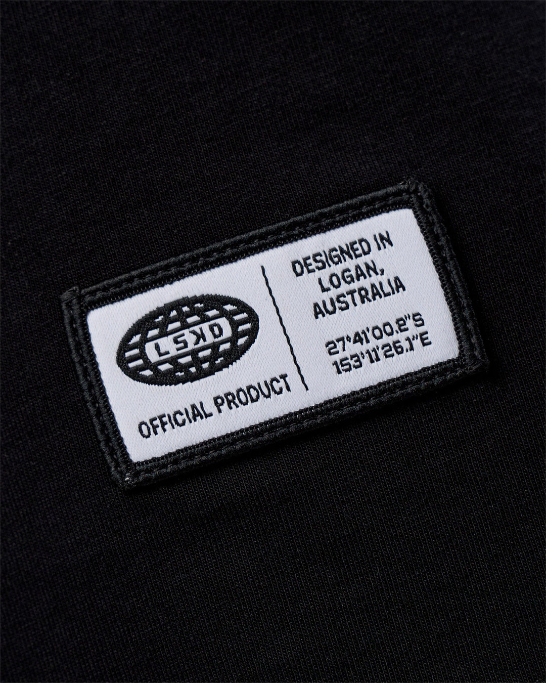 Man wearing Grid FLXCotton Oversized Tee - Black-White | Model:Zoran | Size:L