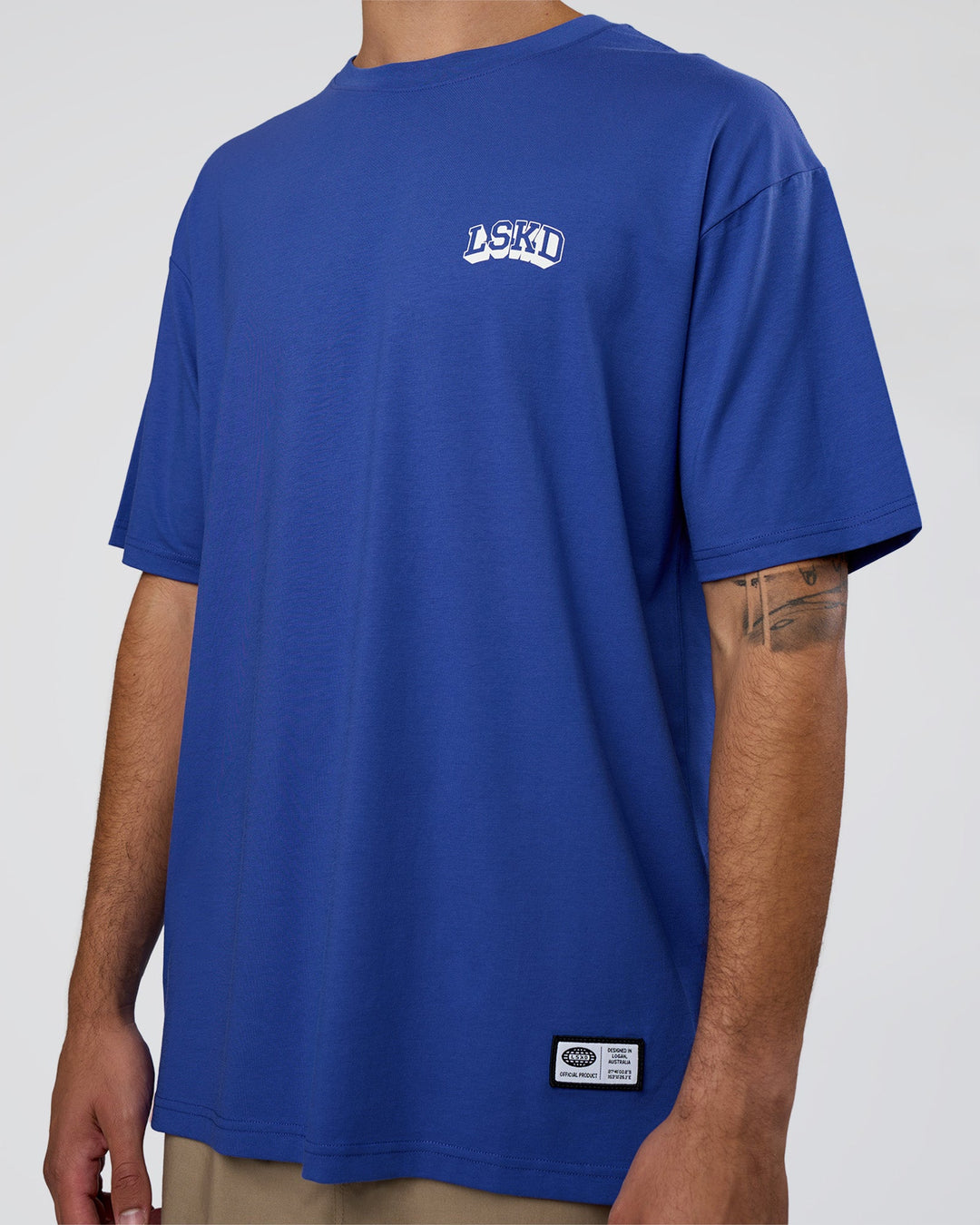 Man wearing Grid FLXCotton Oversized Tee - Power Cobalt-White | Model:Zoran | Size:L