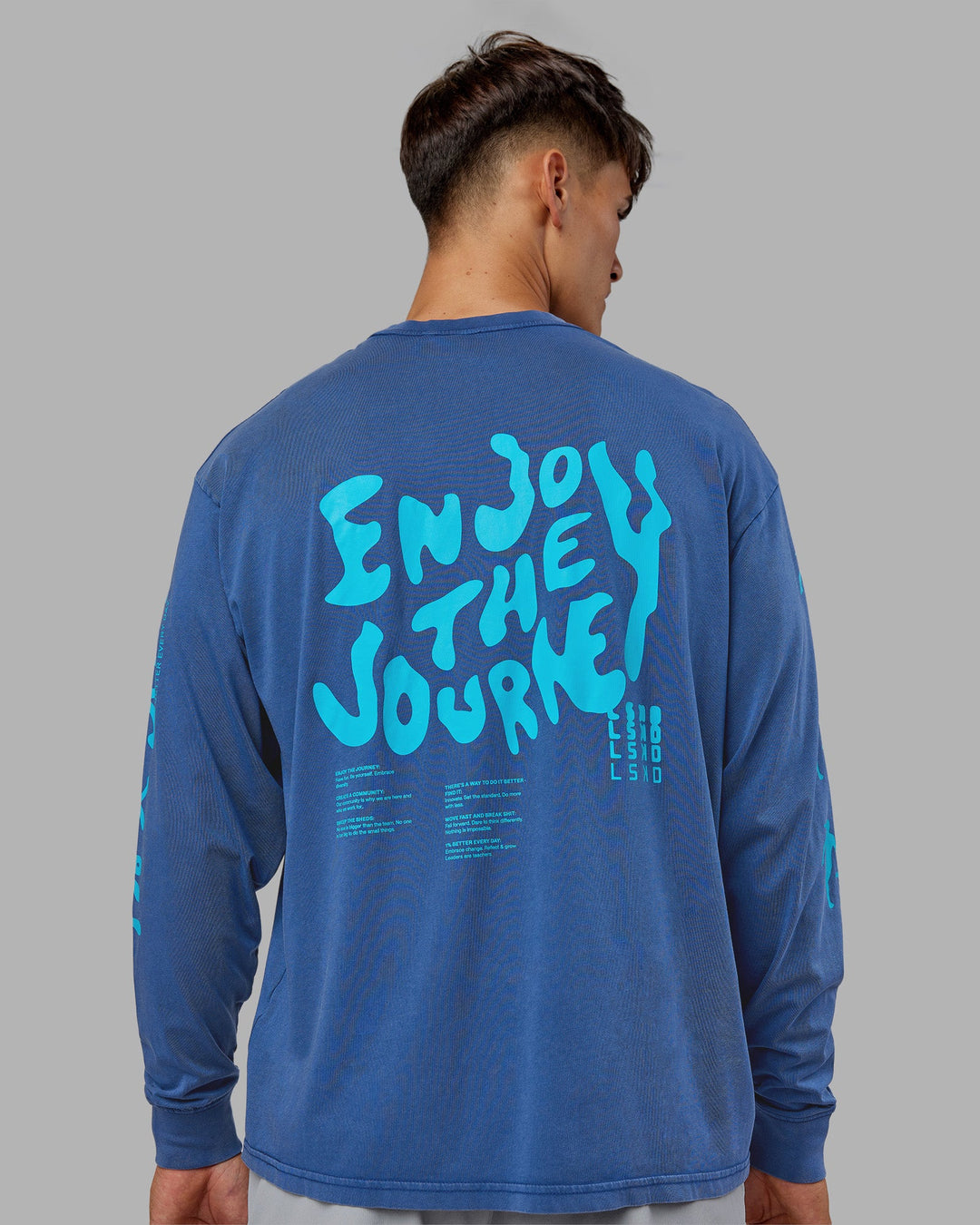 Man wearing Inferno Journey FLXCotton Oversized Long Sleeve Tee - Midnight Blue-Blue Bird | Model:Jackson | Size:L