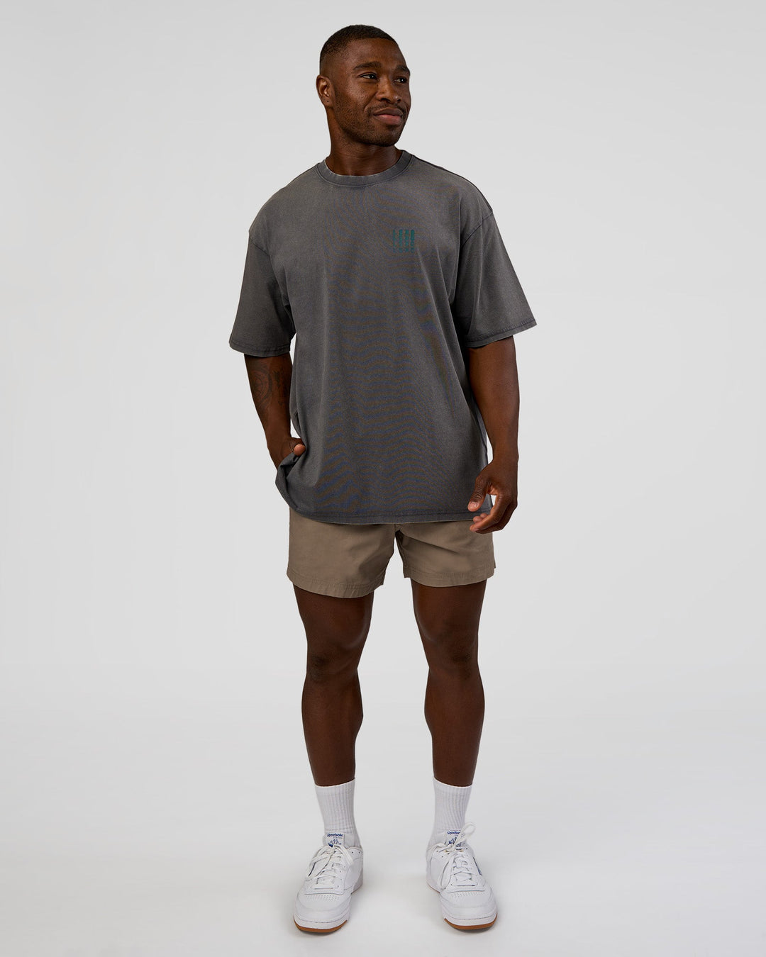 Man wearing Inferno Journey FLXCotton Oversized Tee - Dark Storm Washed-Iceberg Green | Model:Sam | Size:L