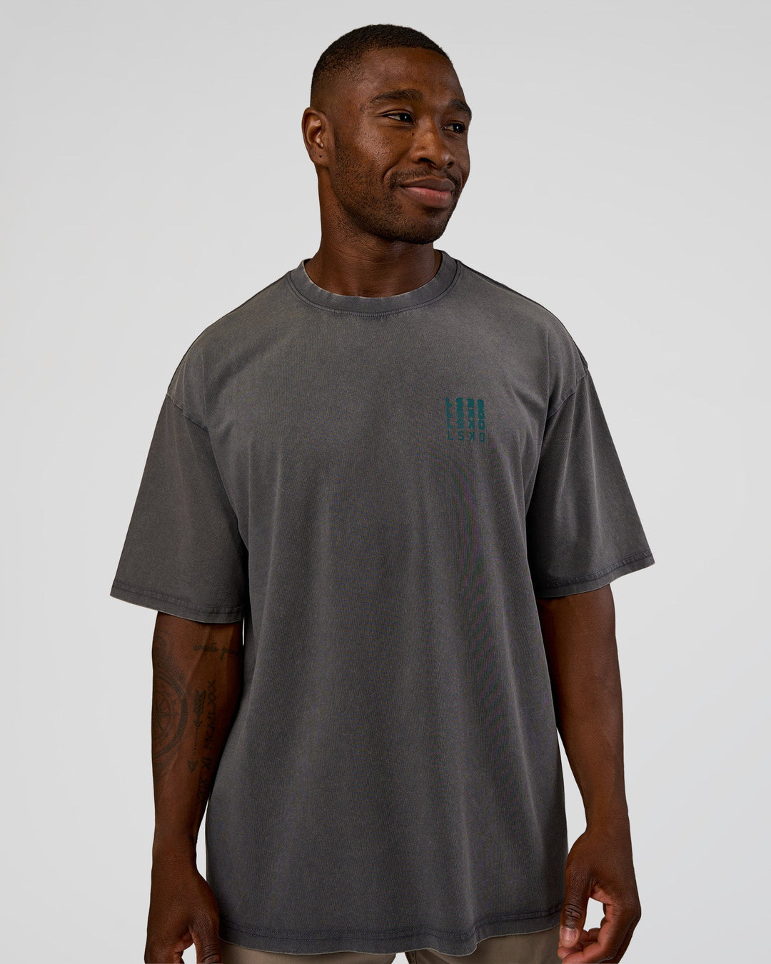 Man wearing Inferno Journey FLXCotton Oversized Tee - Dark Storm Washed-Iceberg Green | Model:Sam | Size:L
