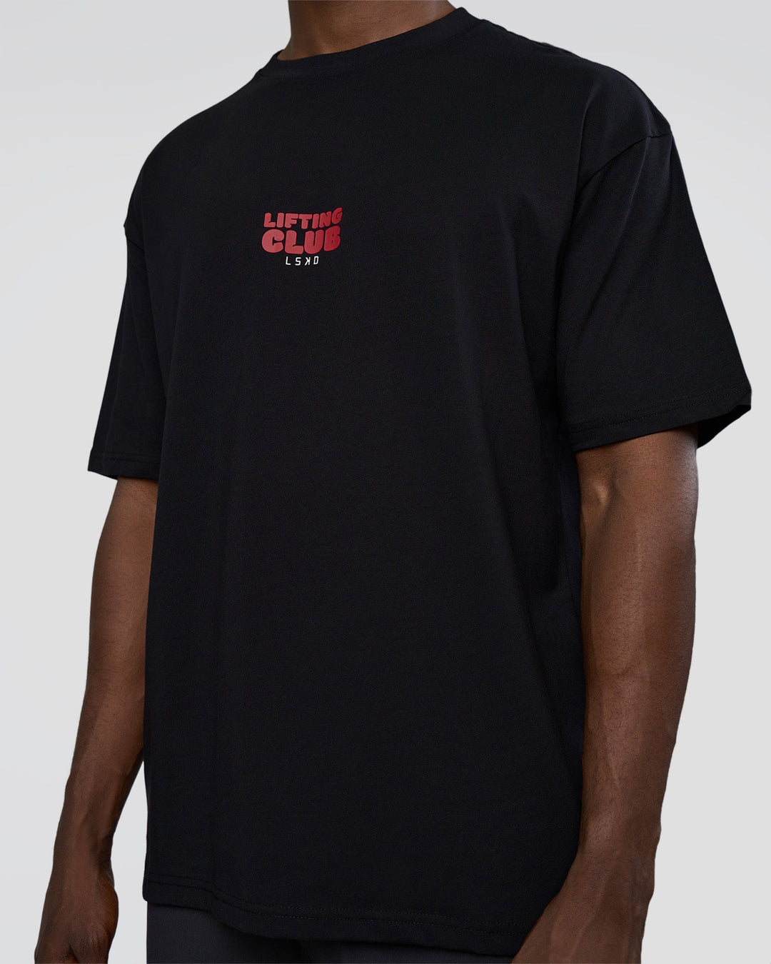 Man wearing Kettle B FLXCotton Oversized Tee - Black-White | Model:Paabio | Size:L