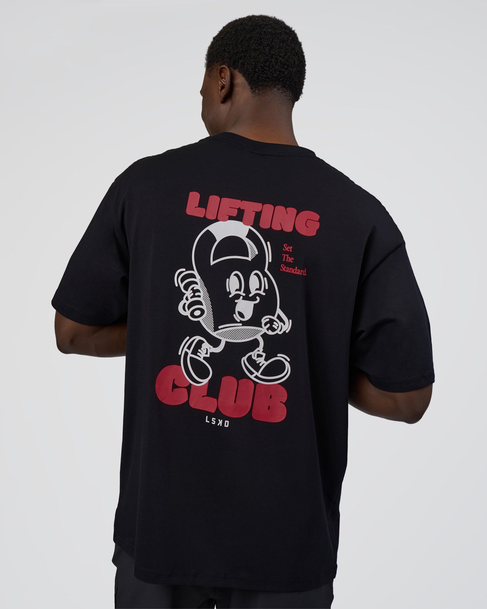 Man wearing Kettle B FLXCotton Oversized Tee - Black-White | Model:Paabio | Size:L