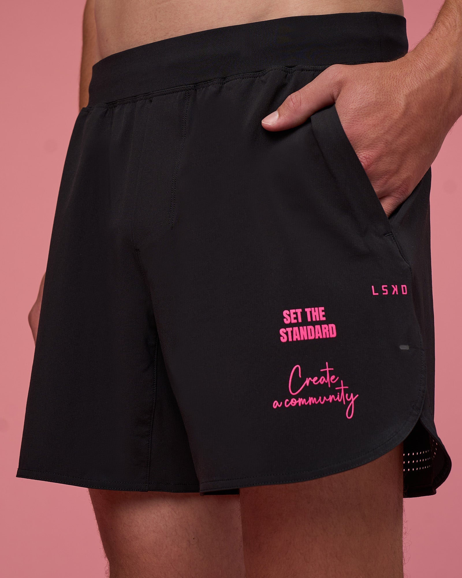 Man wearing Lift 6" Short - Black-Ultra Pink | Model:Brandon | Size:L