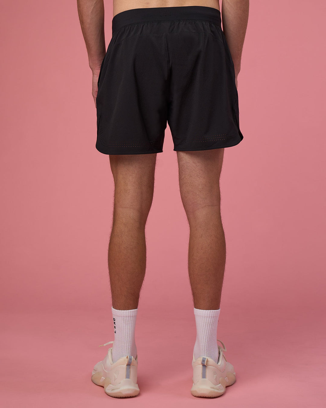 Man wearing Lift 6&quot; Short - Black-Ultra Pink | Model:Brandon | Size:L