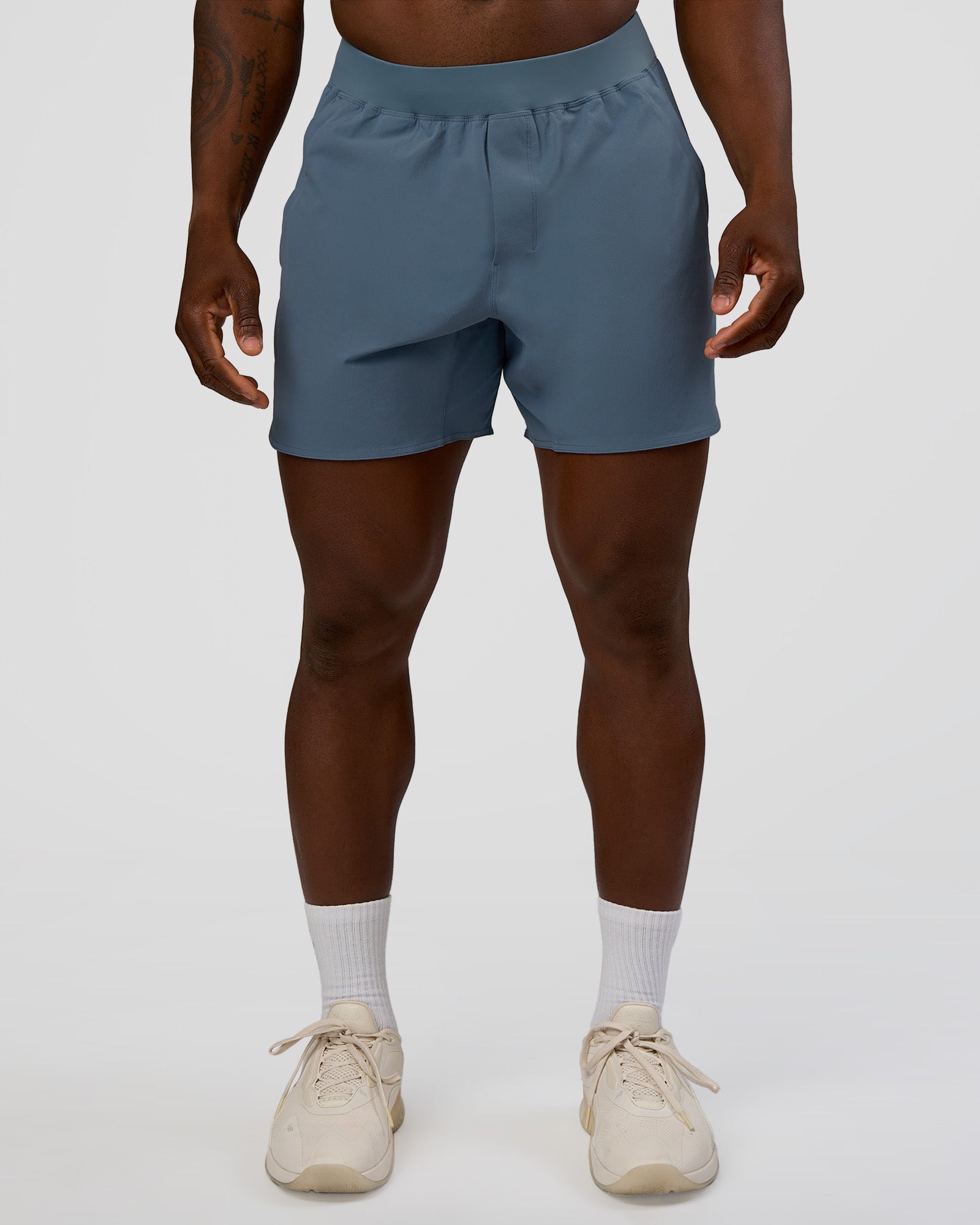 Man wearing Lift 6" Short - Blue Mirage | Model:Sam | Size:L