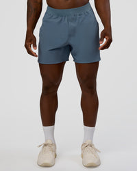 Man wearing Lift 6" Short - Blue Mirage | Model:Sam | Size:L