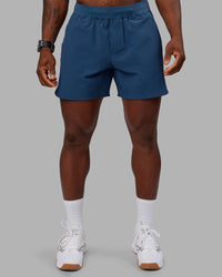 Man wearing Lift 6" Short - Indigo | Model:Sam | Size:L