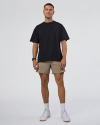 Man wearing Lifting Club FLXCotton Tee Oversize - Black-Black | Model:Nikola | Size:L