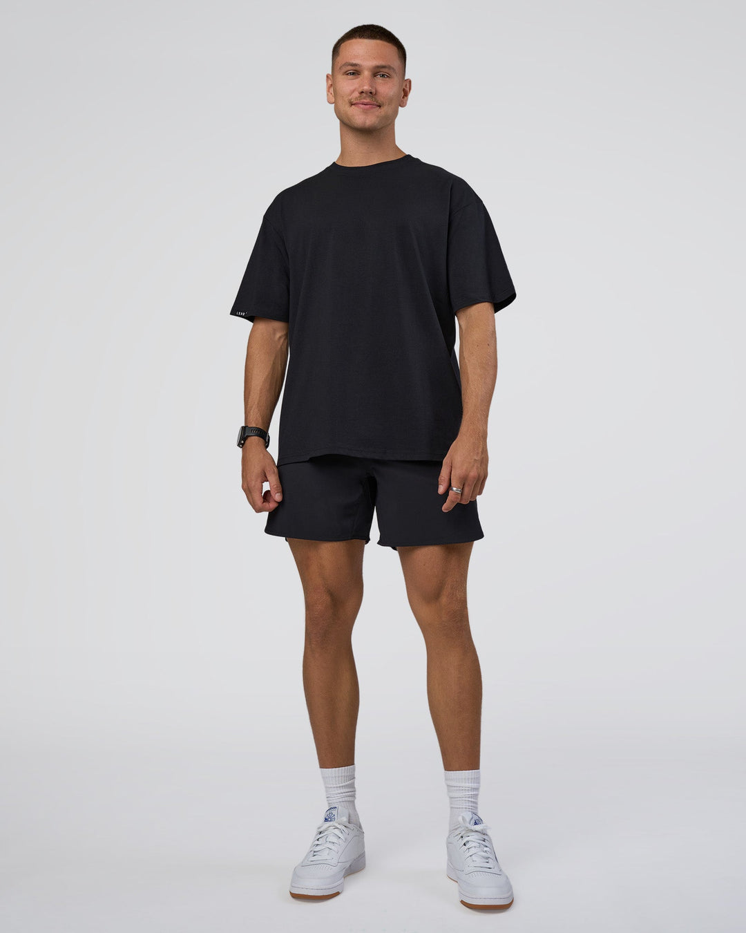 Man wearing Lifting Club FLXCotton Tee Oversize - Black-White-Red | Model:Nikola | Size:L