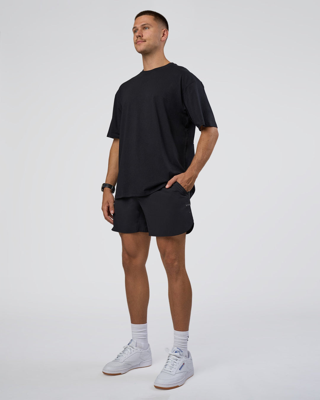 Man wearing Lifting Club FLXCotton Tee Oversize - Black-White-Red | Model:Nikola | Size:L