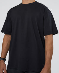 Man wearing Lifting Club FLXCotton Tee Oversize - Black-White-Red | Model:Nikola | Size:L