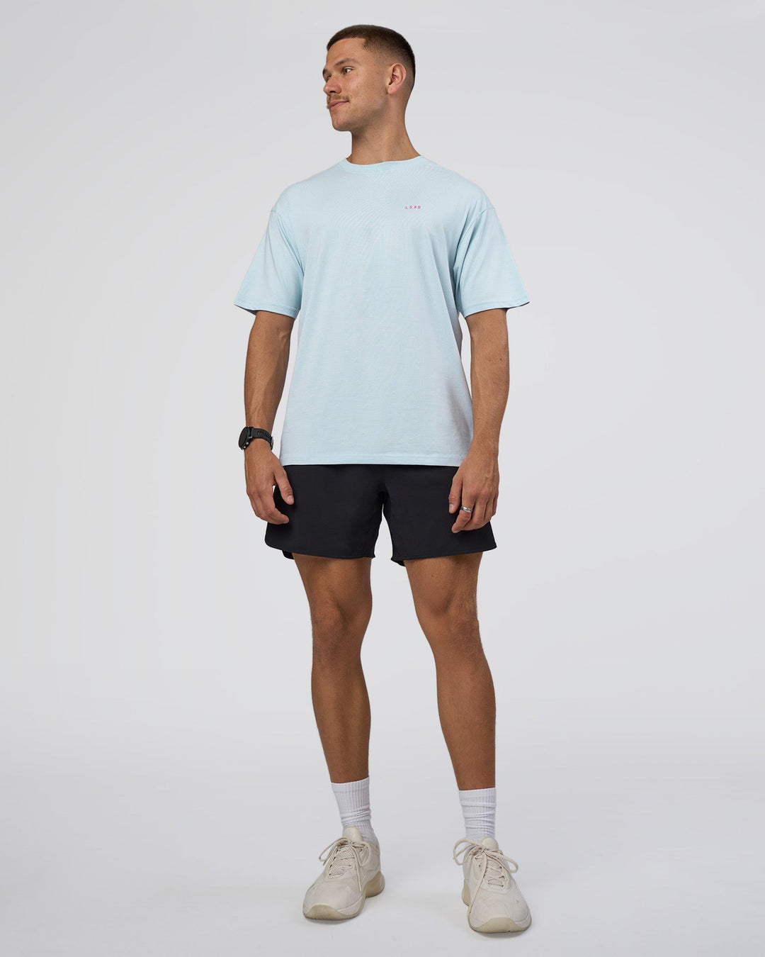 Man wearing Lifting FLXCotton Oversized Tee - Blue Aura-Ultra Pink | Model:Nikola | Size:L