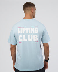 Man wearing Lifting FLXCotton Oversized Tee - Blue Aura-Ultra Pink | Model:Nikola | Size:L