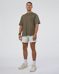 Man wearing Lifting FLXCotton Oversized Tee - Walnut Grey-Hot Chocolate | Model:Nikola | Size:L