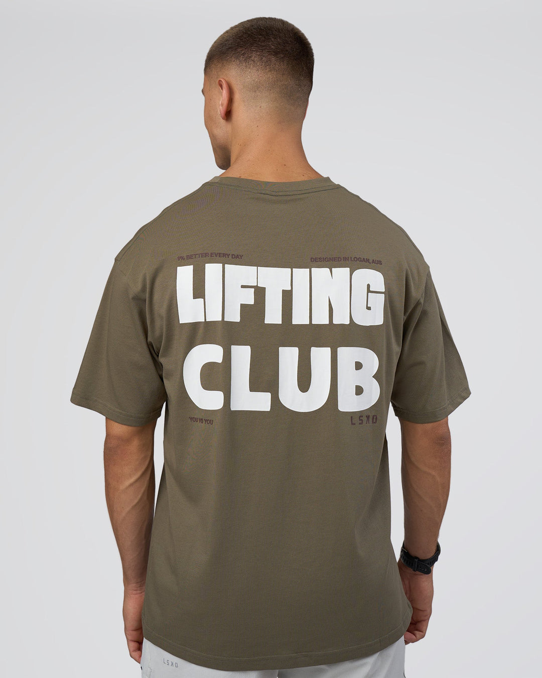 Man wearing Lifting FLXCotton Oversized Tee - Walnut Grey-Hot Chocolate | Model:Nikola | Size:L