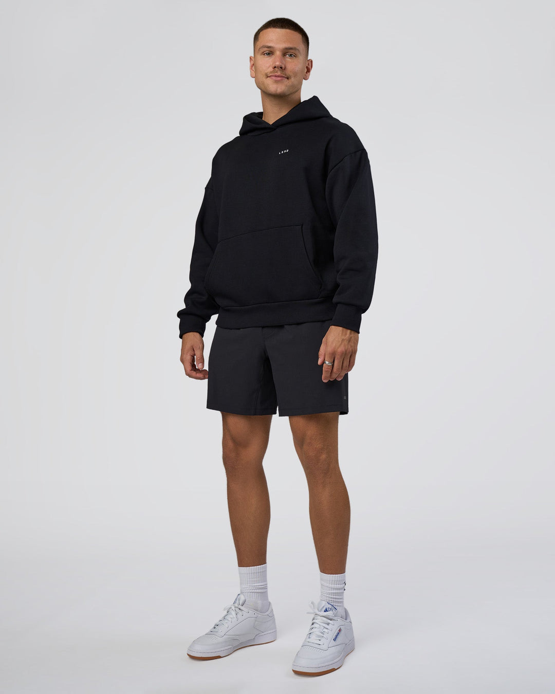 Man wearing Lifting Unisex Oversized Hoodie - Black-Flame| Model:Nikola | Size:L