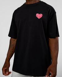 Man wearing Love the Journey FLXCotton Oversized Tee - Black-Flame | Model:Sam | Size:L