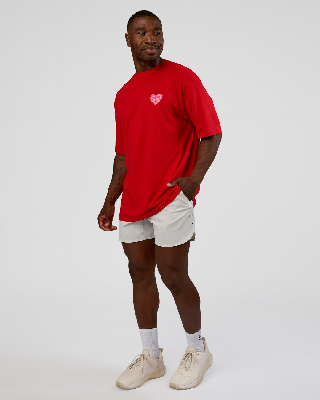 Man wearing Love the Journey FLXCotton Oversized Tee - Flame-Candy Pink | Model:Sam | Size:L