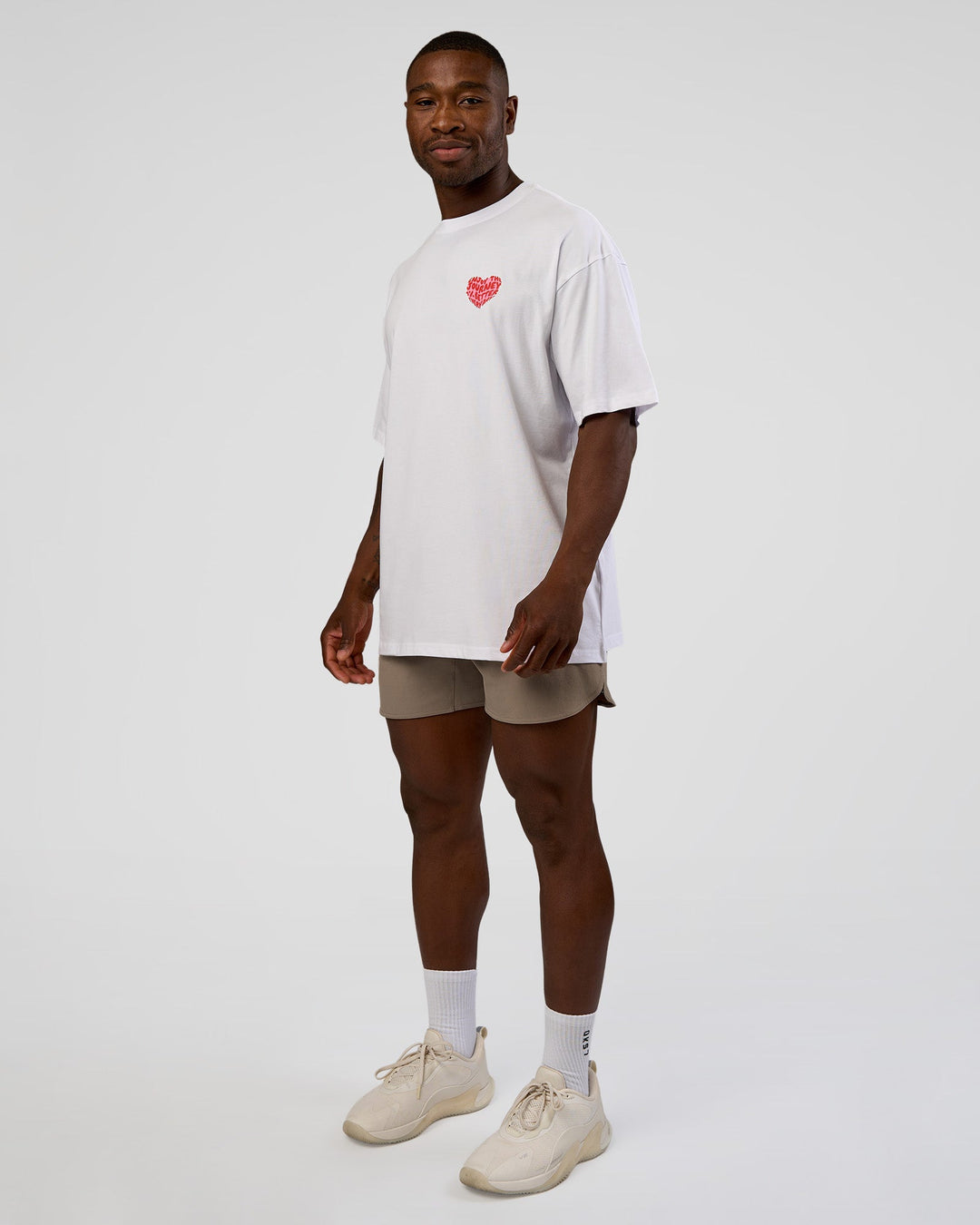 Man wearing Love the Journey FLXCotton Oversized Tee - White-Candy Pink | Model:Sam | Size:L
