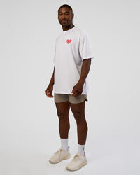 Man wearing Love the Journey FLXCotton Oversized Tee - White-Candy Pink | Model:Sam | Size:L