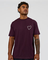 Man wearing Love The Process FLXCotton Oversize Tee - Midnight Plum-White | Model:Xav | Size:L