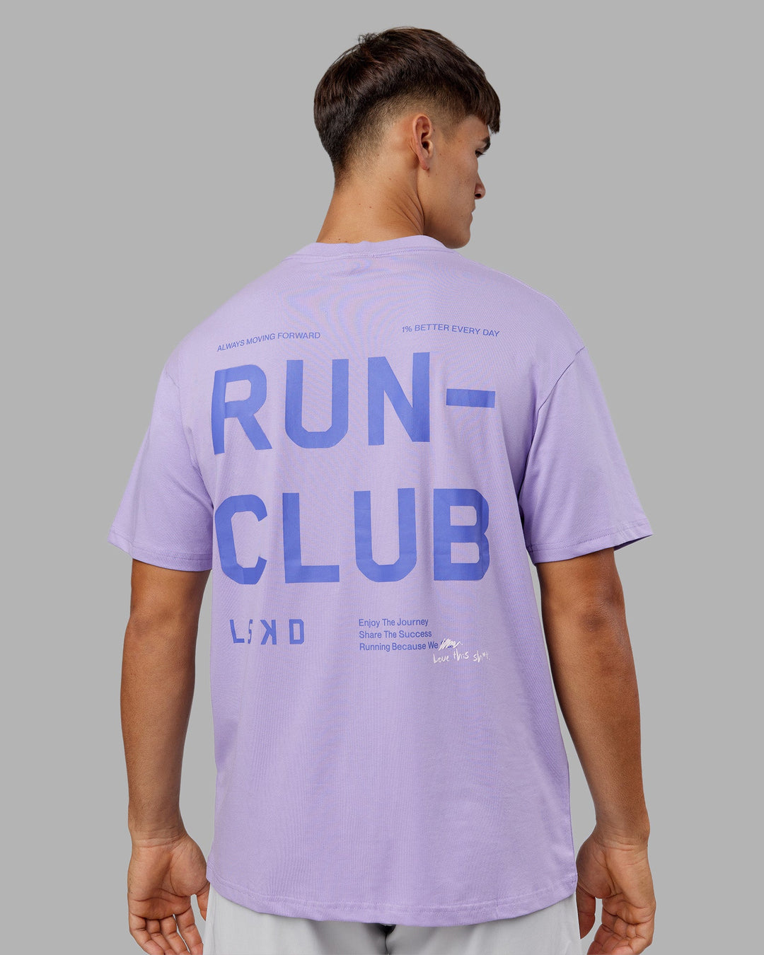 Man wearing Love The Run FLXCotton Tee Oversize - Violet Ray-Royal Purple | Model:Jackson | Size:L